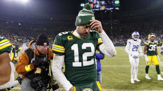 Green Bay Packers QB Aaron Rodgers walks off field